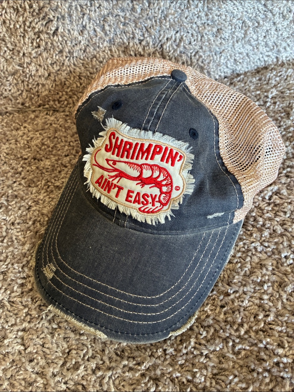 Shrimpin’ Ain’t Easy Distressed Unstructured Trucker SnapBack Cap